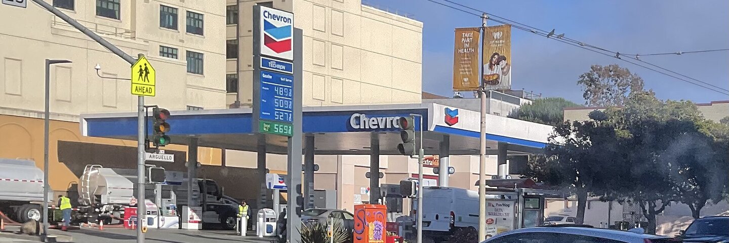 Chevron station canopy, pumps, and price sign