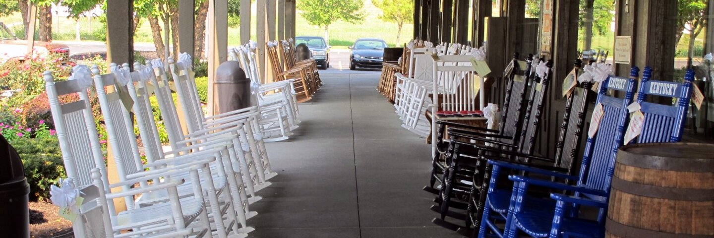 Wooden rocking chairs on a country-store porch
