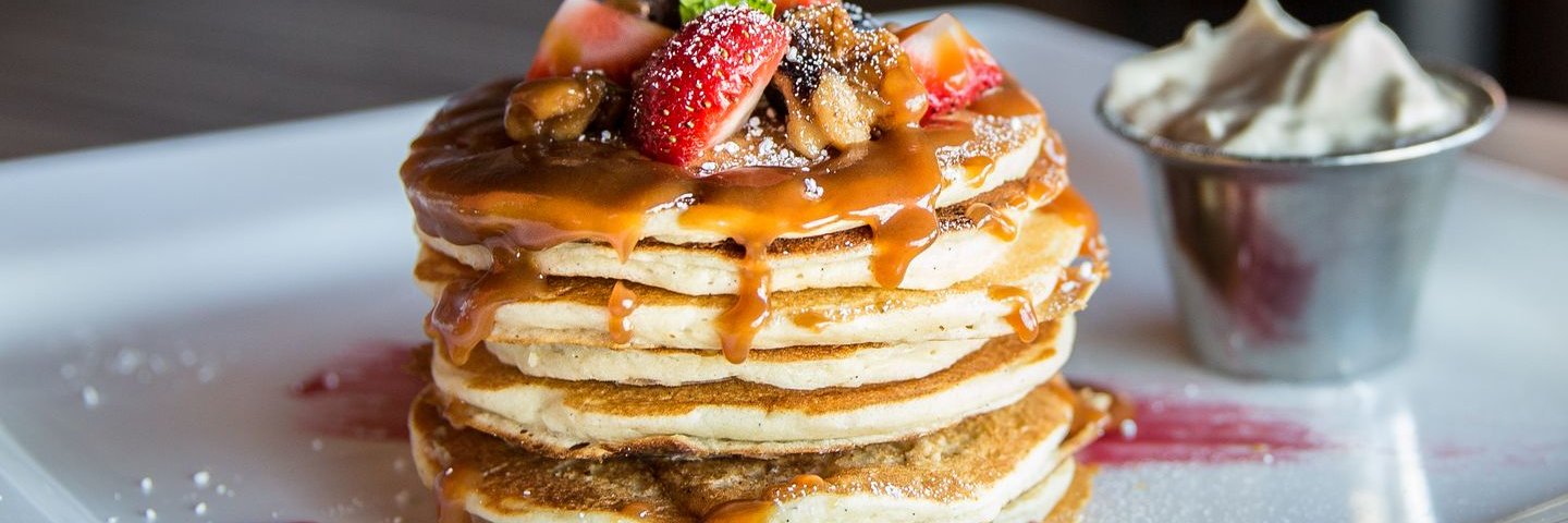 Plate of pancakes with butter
