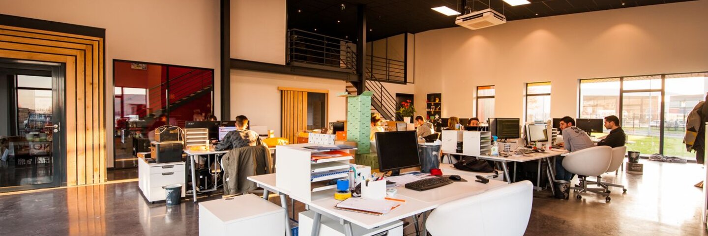 Open office with people working at computers