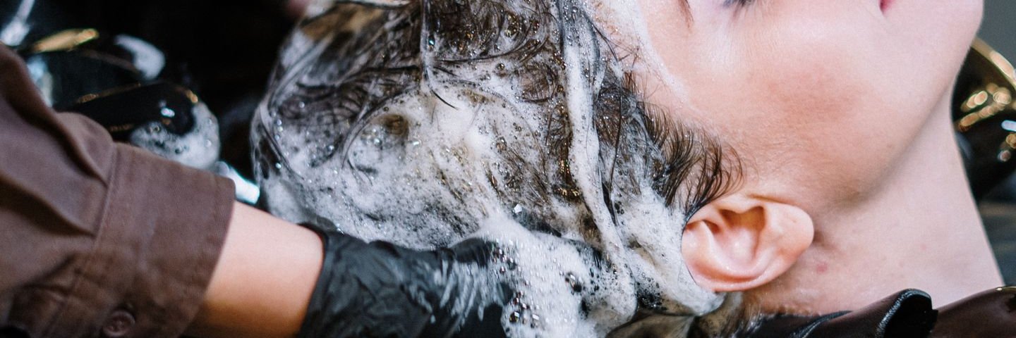 Hair-care bottles on a vanity