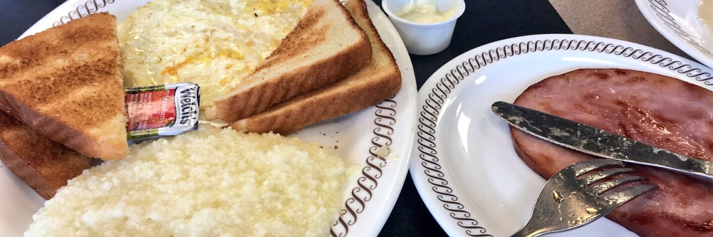 Waffle House breakfast plates with toast, grits, and ham